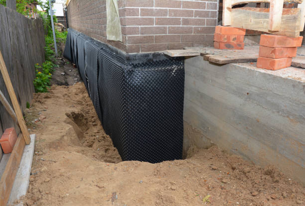 Happy homeowners after waterproofing job in Mount Sterling